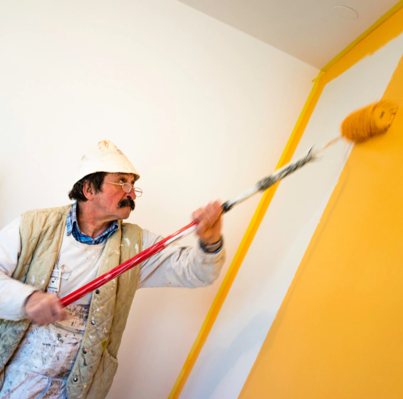 worker doing interior painting service