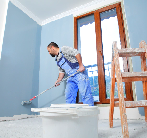 worker during a residential painting service